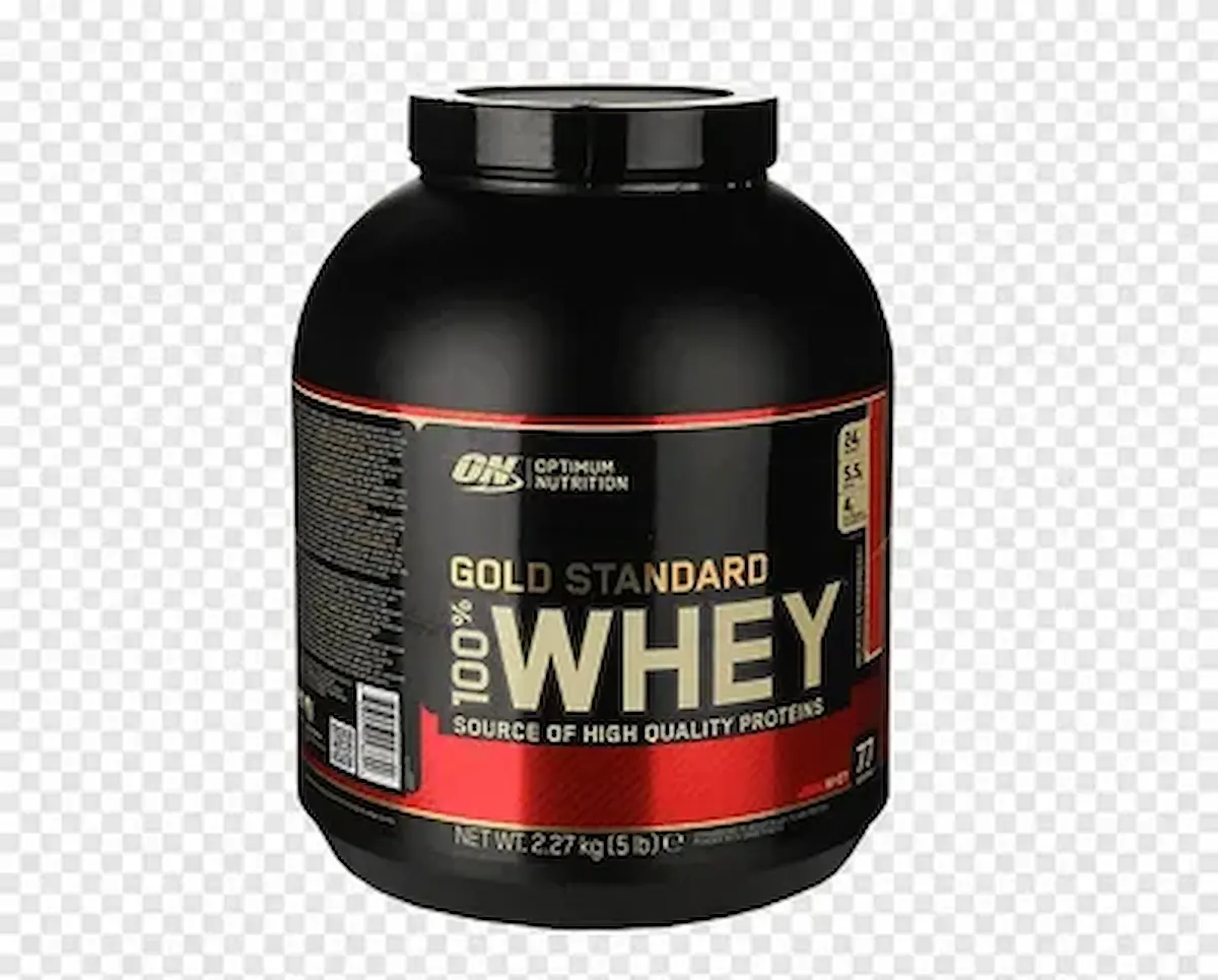 A large black container labeled "Gold Standard 100% Whey" by Optimum Nutrition, containing 5 pounds (2.27 kg) of whey protein powder. The label also mentions it as a "source of high quality proteins" and has a red and gold design.